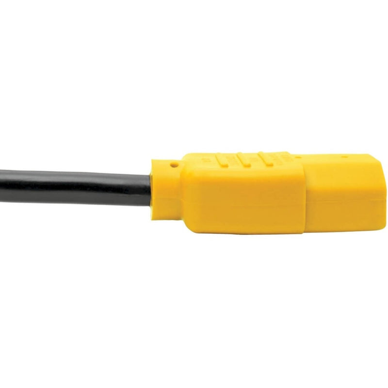 Close-up profile view of yellow power cord connector showing industrial construction