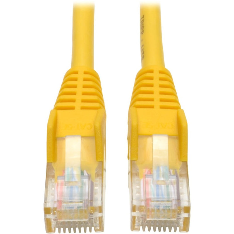 Close-up view of yellow Cat5e cable ends showing snagless RJ45 connectors with transparent housing and strain relief boots