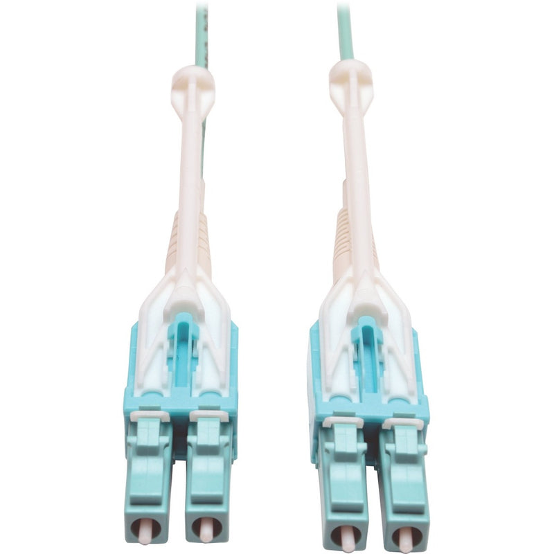 Close-up view of dual LC connectors with push/pull tabs on Tripp Lite OM3 fiber optic cable