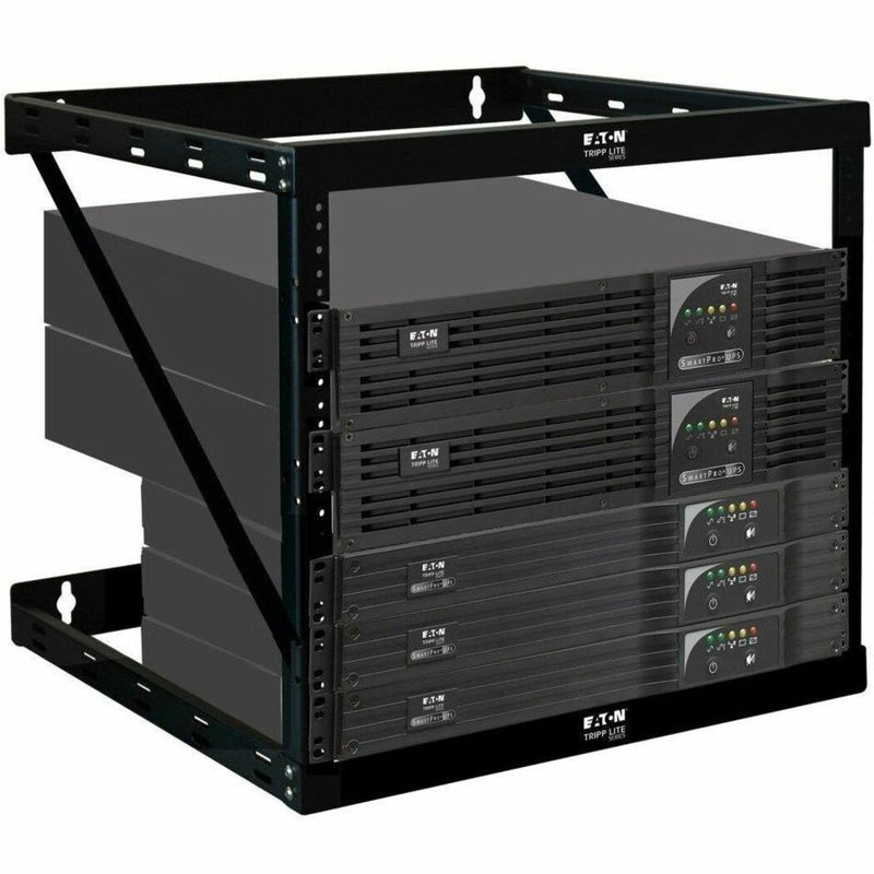 Tripp Lite wall-mount rack loaded with multiple UPS units showing practical equipment installation and accessibility