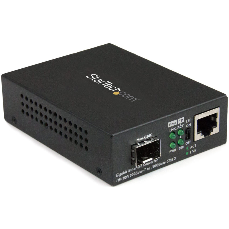 Front angled view of StarTech.com Gigabit Ethernet Fiber Media Converter showing SFP slot, RJ45 port, and LED indicators