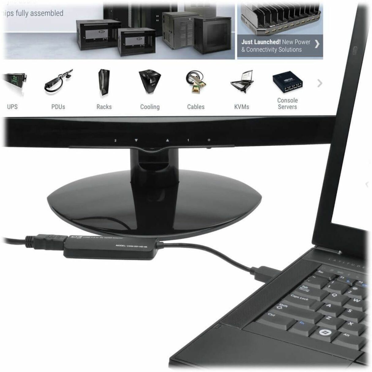 Demonstration of U344-001-HD-4K adapter connected between a laptop and monitor in a business setting-alternate-image2