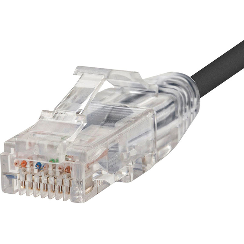 Detailed macro shot of SlimRun CAT6 cable's transparent snagless connector showing internal pin configuration