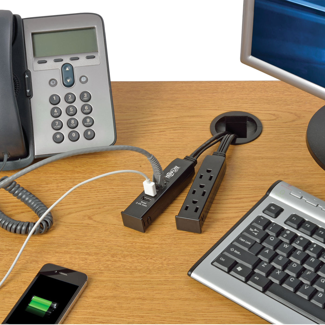 Active workspace setup with TLP310DMUSB powering multiple devices including phone charging-alternate-image4