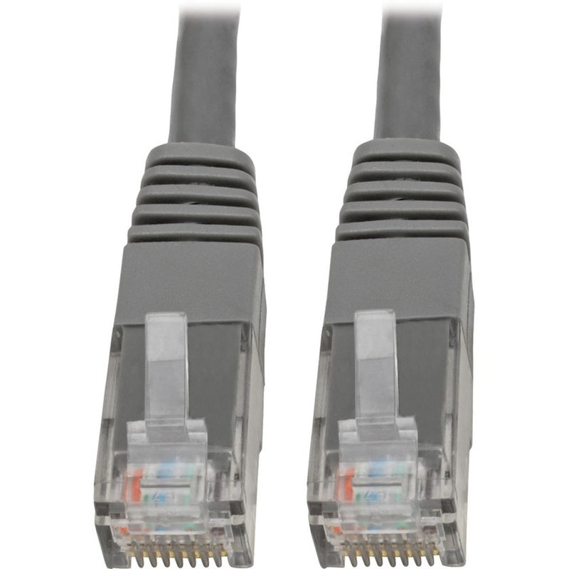 Close-up view of two gray Cat6 cable RJ45 connectors with gold-plated pins and strain relief