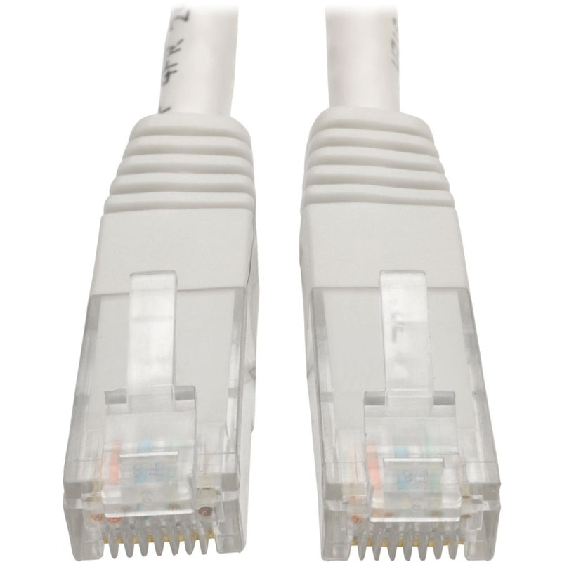 Close-up view of white Cat6 cable RJ-45 connectors showing gold-plated pins and strain relief design