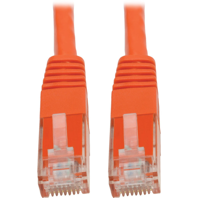 Close-up view of orange Cat6 cable RJ45 connectors showing gold-plated contacts and strain relief design