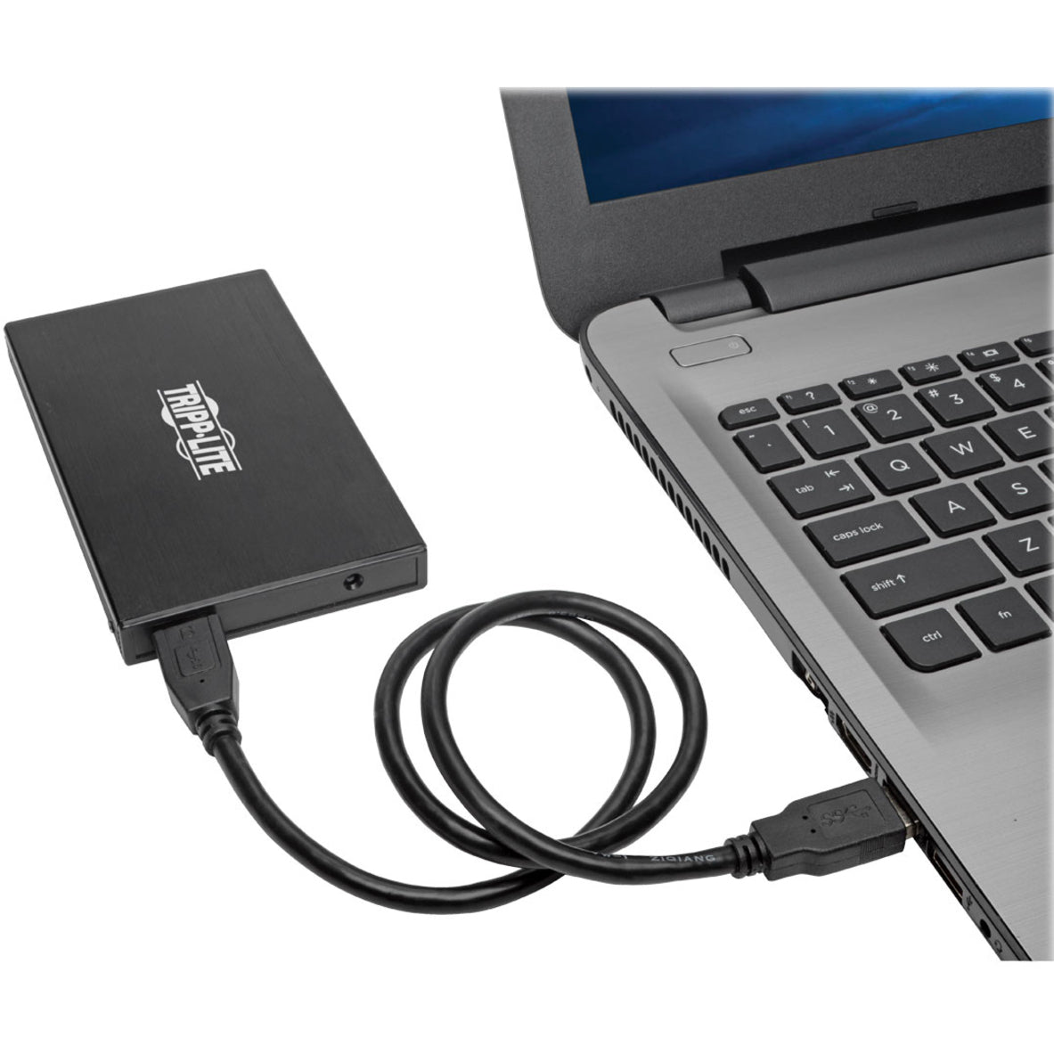 Tripp Lite drive enclosure connected to laptop USB port showing easy connectivity-alternate-image2