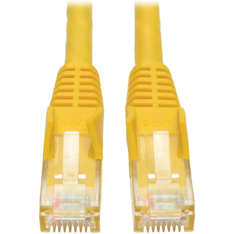 Close-up view of two yellow Cat6 RJ45 connectors with gold-plated contacts and snagless boots