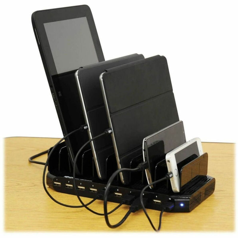 USB charging station with multiple devices charging and organized in slots