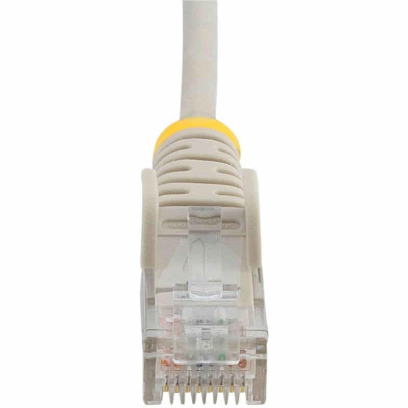 Macro shot of RJ45 connector showing internal contact array and construction