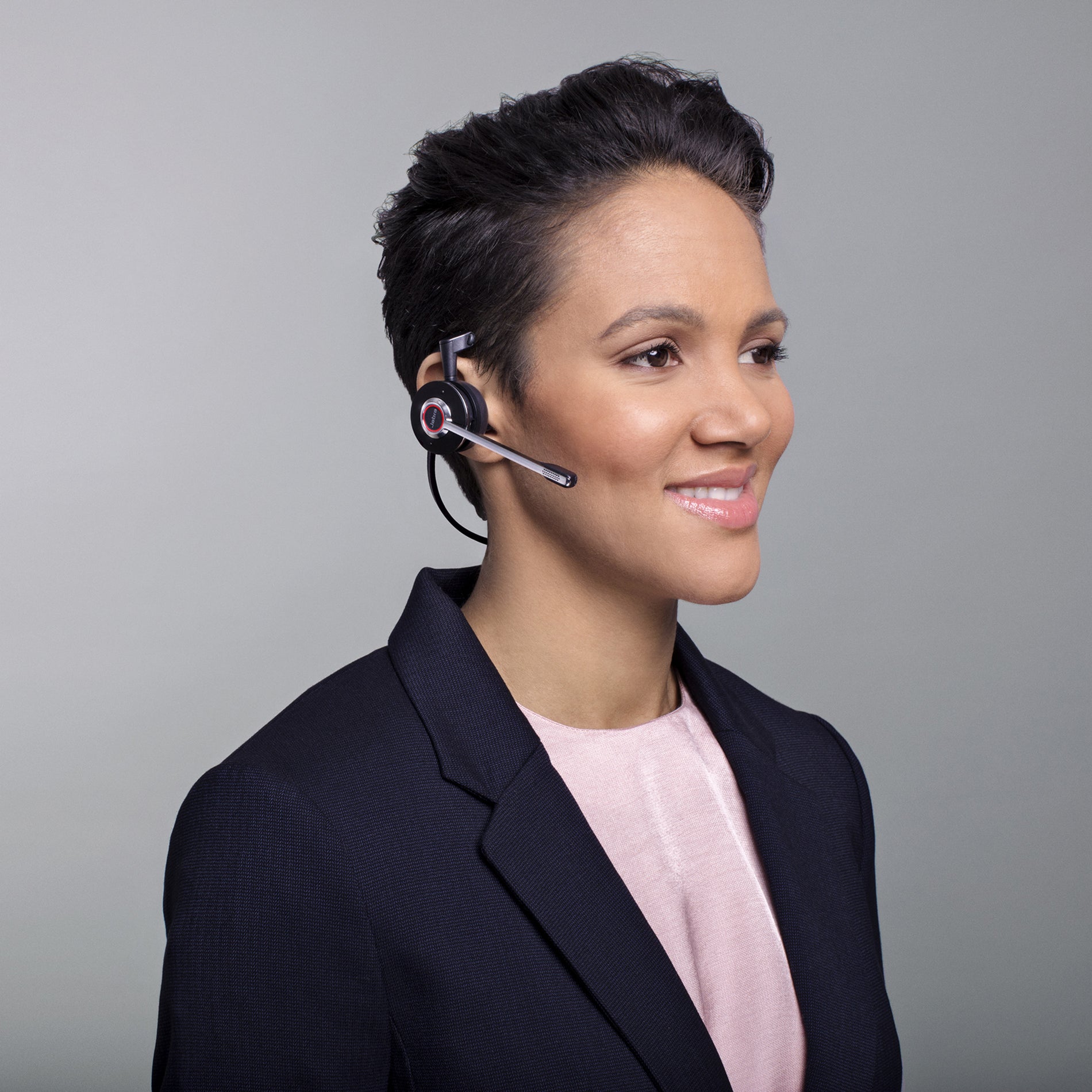 Professional wearing Jabra Engage 75 Mono in business attire-alternate-image15