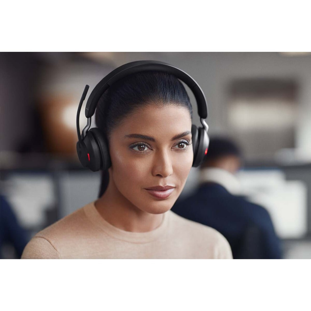 Professional focused while wearing Jabra Evolve2 65 headset-alternate-image10