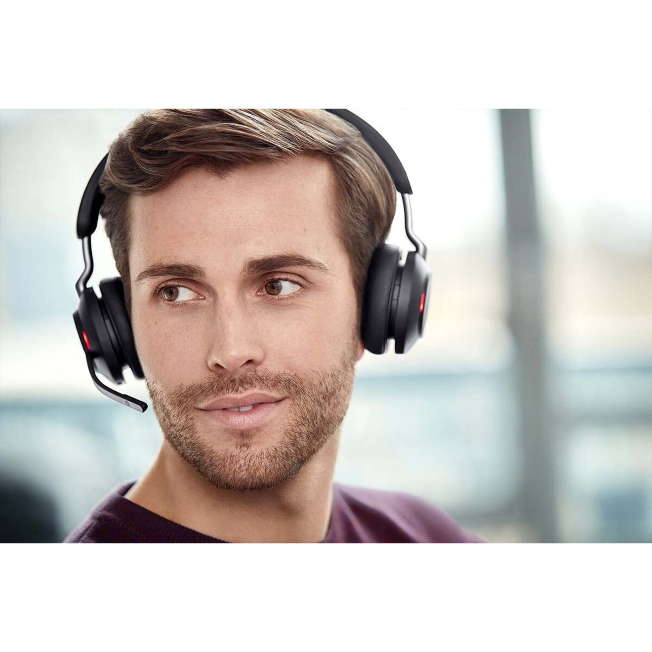 Close-up portrait of professional wearing Jabra Evolve2 65 headset-alternate-image8