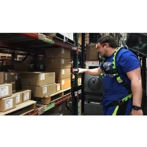 Worker scanning inventory items in warehouse shelving system-alternate-image4