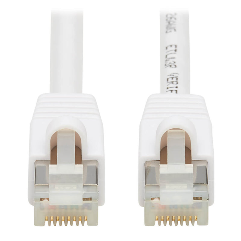 Close-up view of white Cat6a cable ends showing gold-plated RJ45 connectors with snagless boots