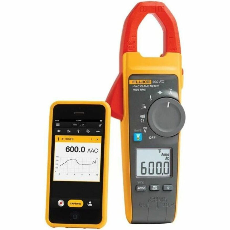 Fluke 902 FC clamp meter displaying measurements alongside smartphone with Fluke Connect app