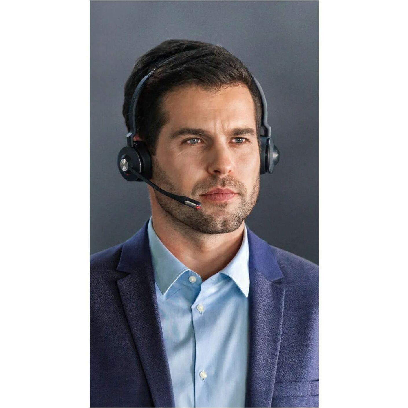 Professional wearing Jabra Engage 65 headset in office setting-alternate-image3