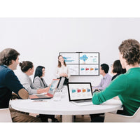 Team meeting in progress with participants viewing shared content on wall-mounted display while using laptops-alternate-image6