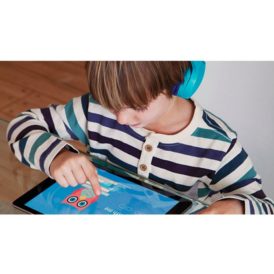 Child engaged with educational content on tablet while wearing SoundForm Mini headphones-alternate-image7