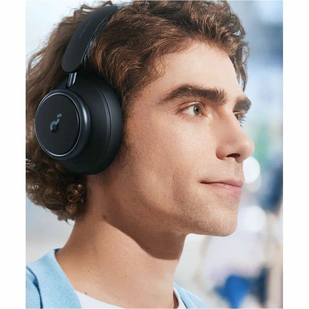 Side profile view of person wearing black Space Q45 headphones showing comfortable fit-alternate-image2