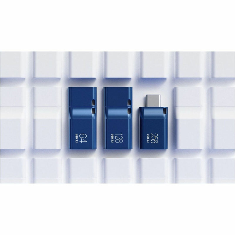 Three Samsung USB-C flash drives of different capacities arranged on white grid background