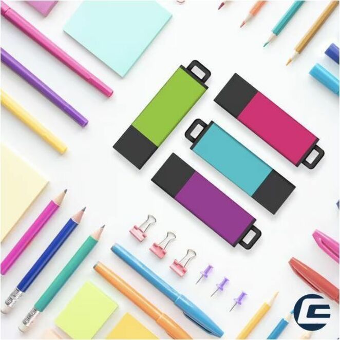 Multiple Centon DataStick Pro2 USB drives in various colors arranged with office supplies and stationery items-alternate-image2