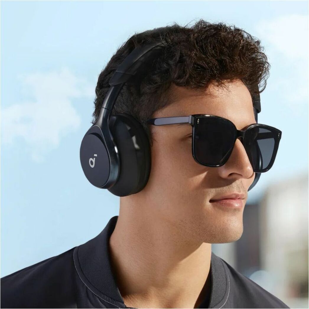 Person wearing Space One headphones with sunglasses in outdoor setting-alternate-image11