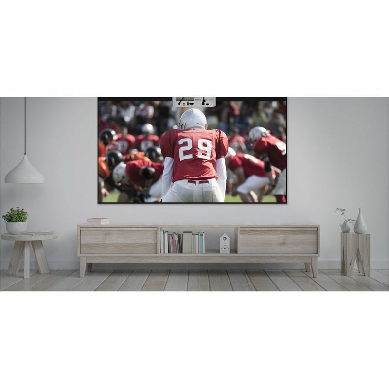 Living room setup showing large projected sports content from Optoma UHZ35ST