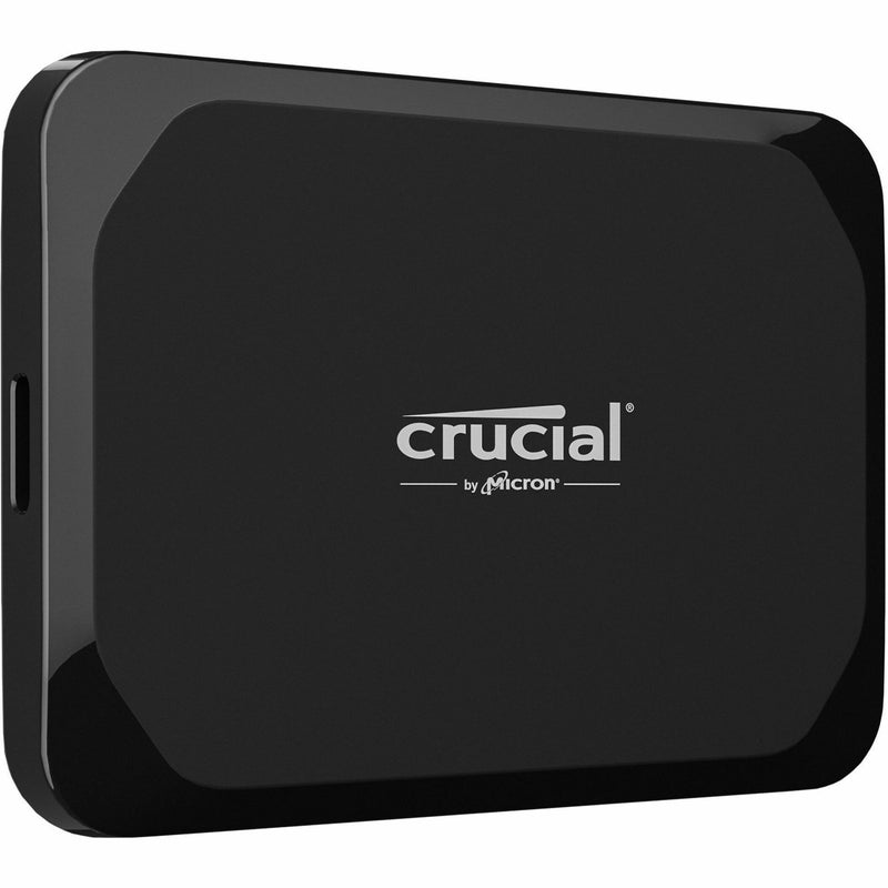 Crucial X9 4TB Portable SSD in sleek black design with Crucial and Micron branding