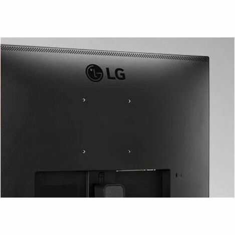 Close-up of VESA mount points on LG monitor