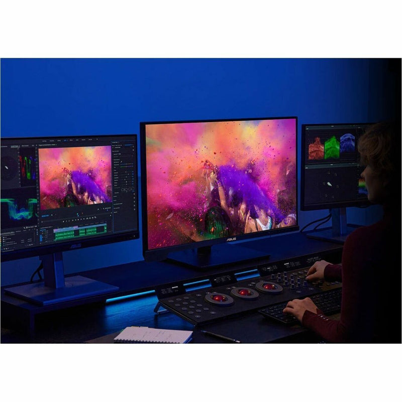 Multi-monitor setup with ASUS ProArt PA32UCXR in professional editing environment