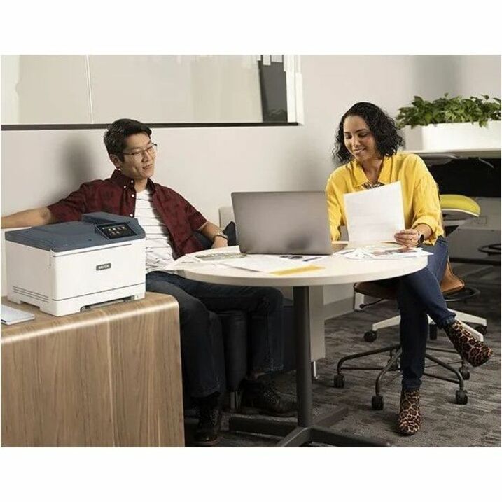 Xerox C410 printer in a modern office setting with professionals collaborating-alternate-image5