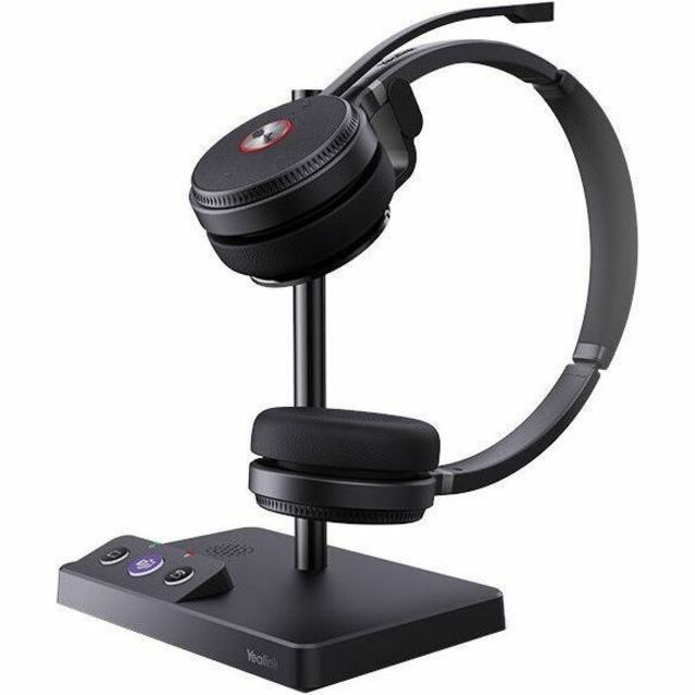 Yealink WH62 headset mounted on its charging stand with control buttons on the base-alternate-image1