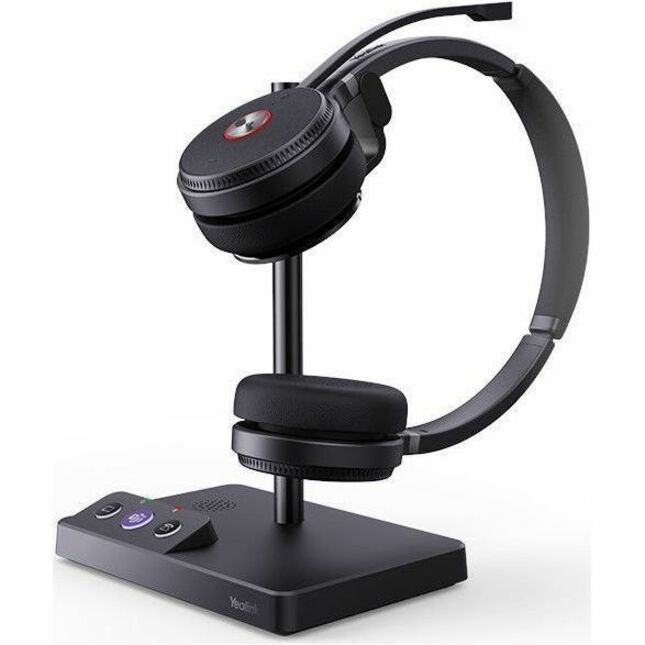 Yealink WH62 headset mounted on its charging stand with control base-alternate-image2