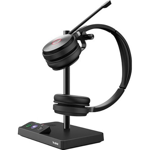 Yealink WH62 headset mounted on its charging base station showing connectivity ports and status indicators-alternate-image2