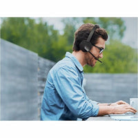 Professional using Yealink BH70 headset in outdoor working environment-alternate-image4