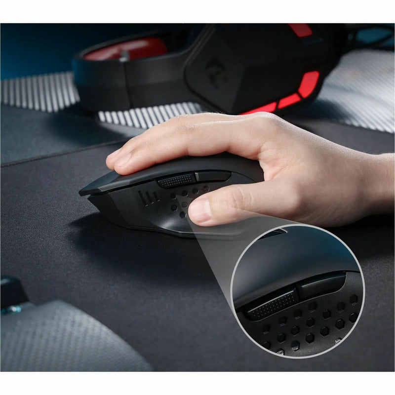 Close-up of Redragon M656 gaming mouse side grip pattern and texture