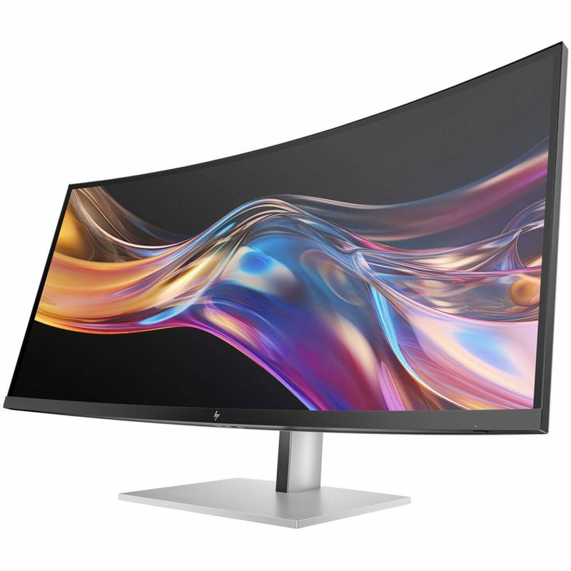 Front view of HP 738PU 38-inch curved monitor displaying colorful abstract waves against black background