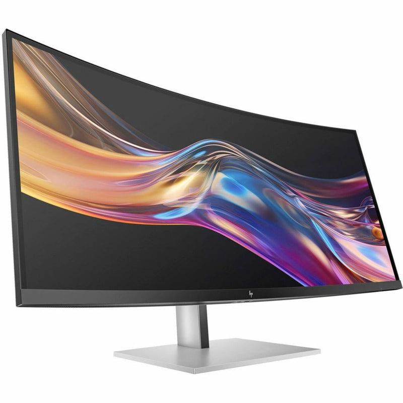 Three-quarter view of HP 738PU monitor emphasizing the ultra-wide curved display