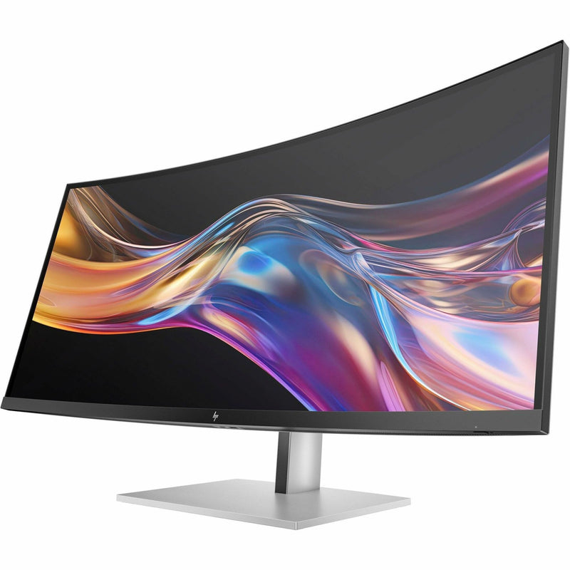 Front view of HP 738PU 38-inch curved monitor displaying colorful abstract waves against black background