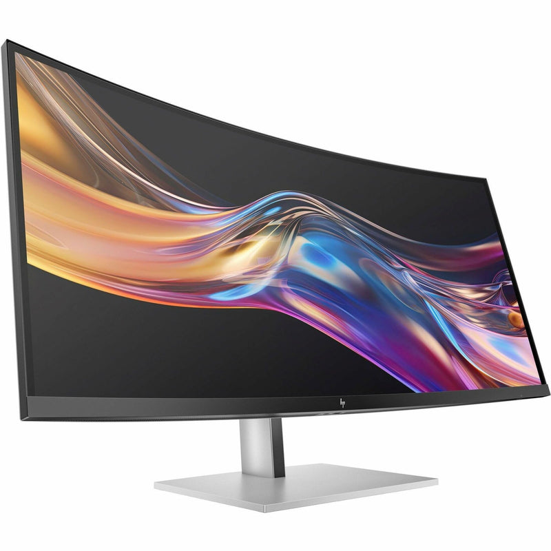 Angled view of HP 738PU monitor showing curved screen profile and silver stand