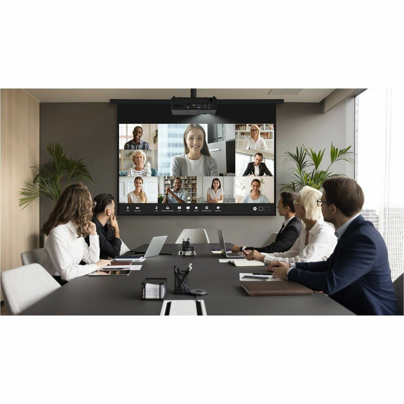 Conference room setup showing hybrid meeting with projected video conference