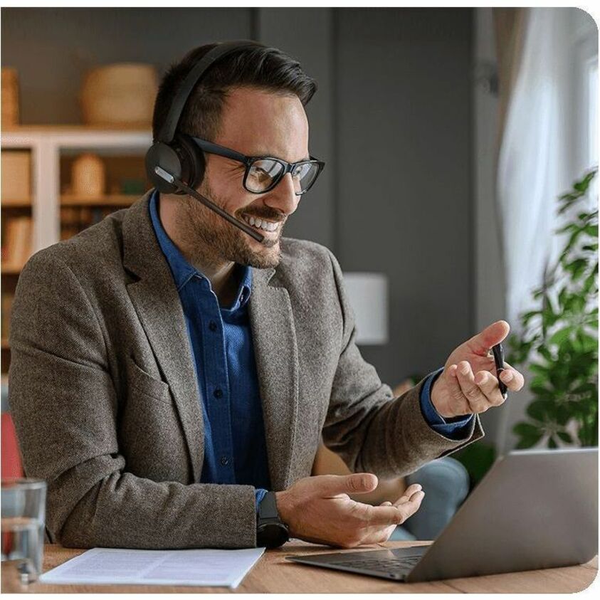 Business professional using Yealink WH64 headset during video conference-alternate-image4