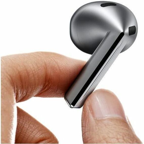 Earbud held between fingers for size reference