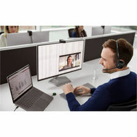 Professional using Jabra headset at desk with multiple monitors-alternate-image2