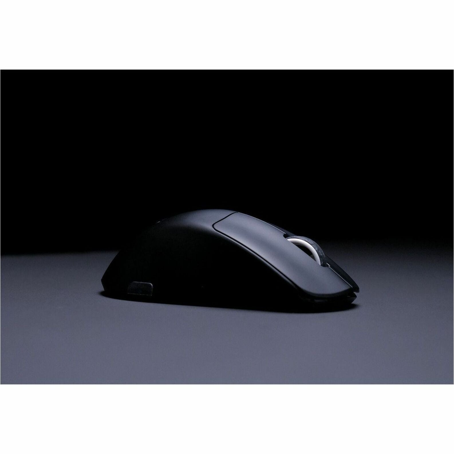 Dramatic side view of CHERRY XTRFY M64 Pro Wireless gaming mouse in shadow-alternate-image8