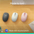 Three Logitech M196 mice in different colors displayed on wooden surface-alternate-image4