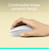 Side view of hand holding Logitech M196 mouse showing ergonomic design-alternate-image3