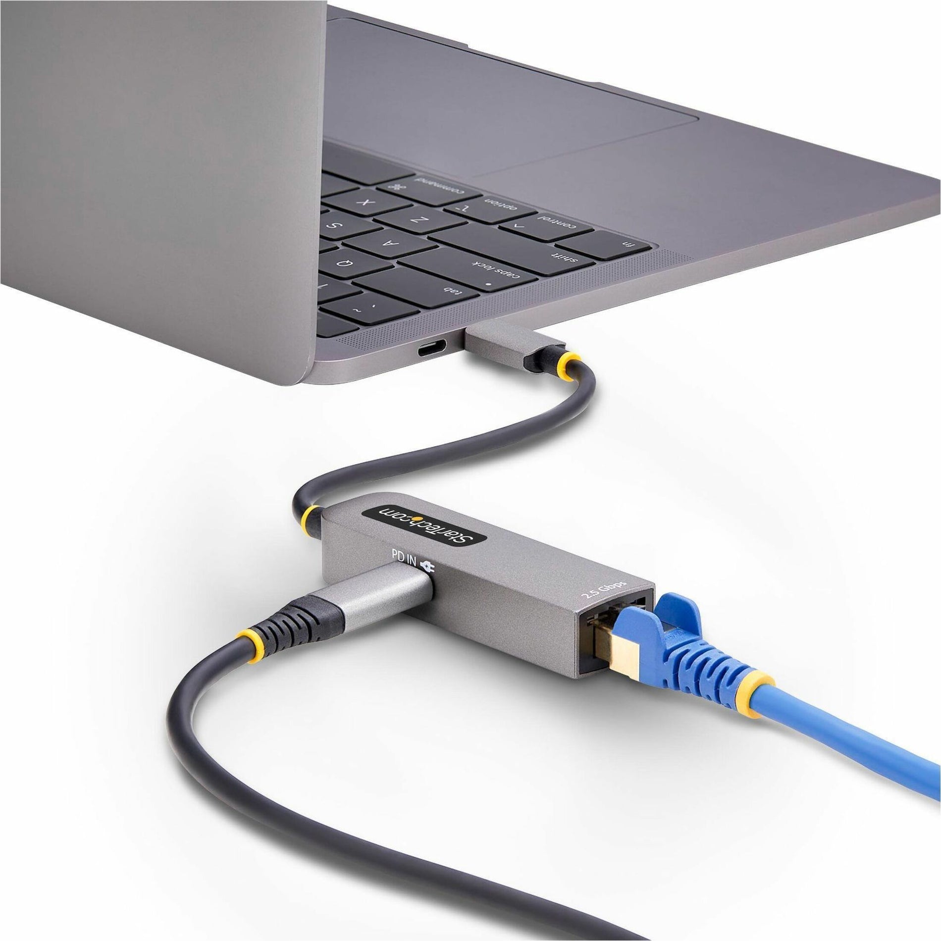 Angled view of the adapter connected to a laptop with ethernet cable-alternate-image7